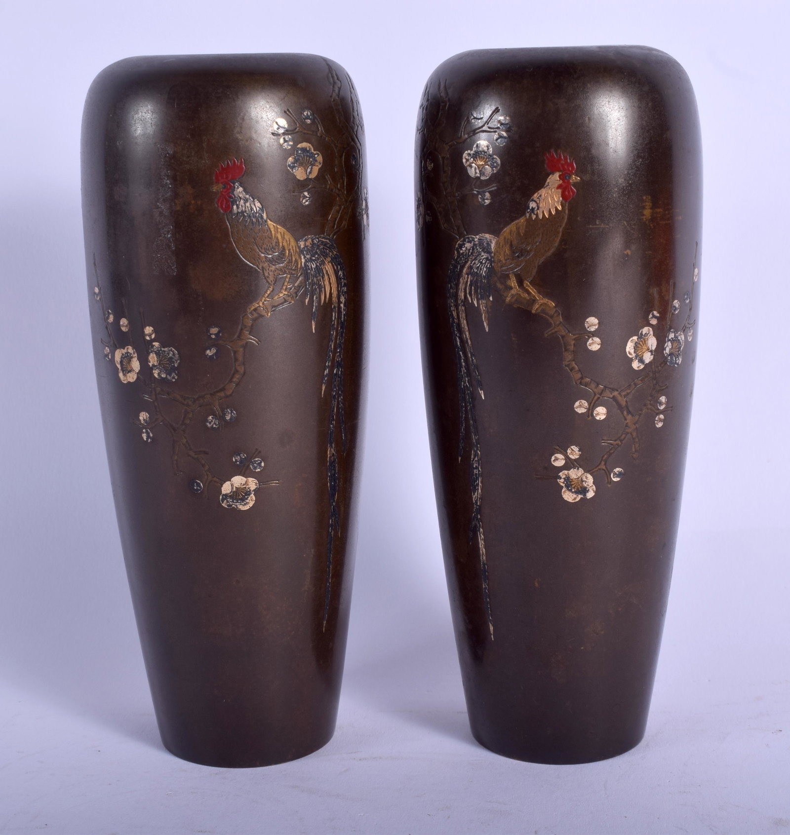 A PAIR OF 19TH CENTURY JAPANESE MEIJI PERIOD BRONZE: A PAIR OF 19TH CENTURY JAPANESE MEIJI PERIOD BRONZE VASES decorated with fowl amongst foliage. 15.5 cm high.