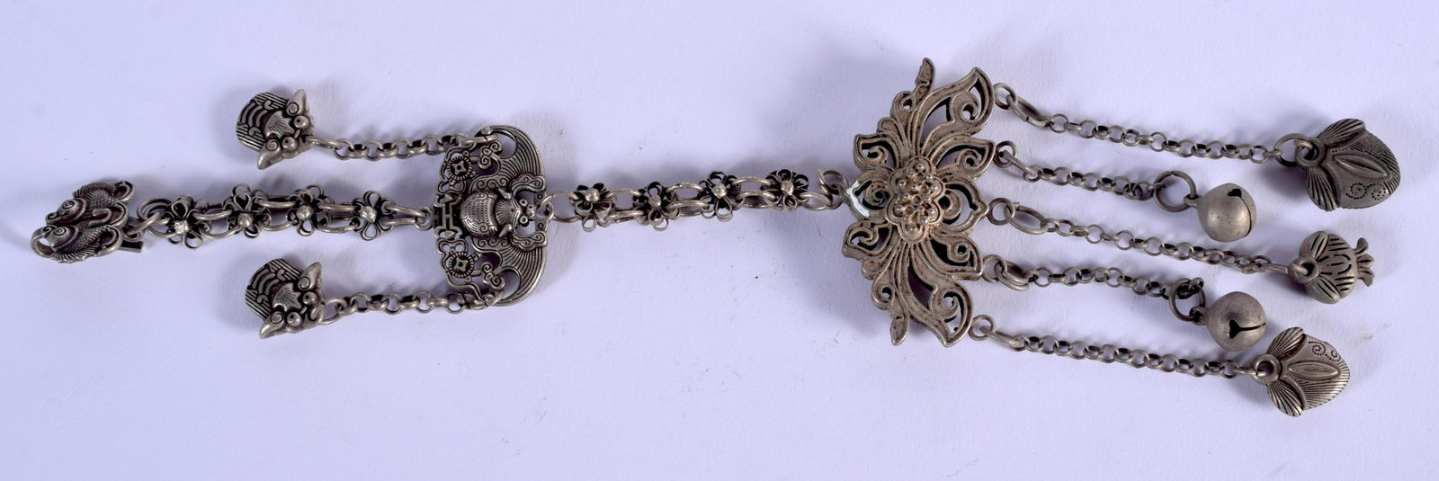A CHINESE WHITE METAL CHATELAINE. 89 grams. 9.5 cm x 6: A CHINESE WHITE METAL CHATELAINE. 89 grams. 9.5 cm x 6 cm.