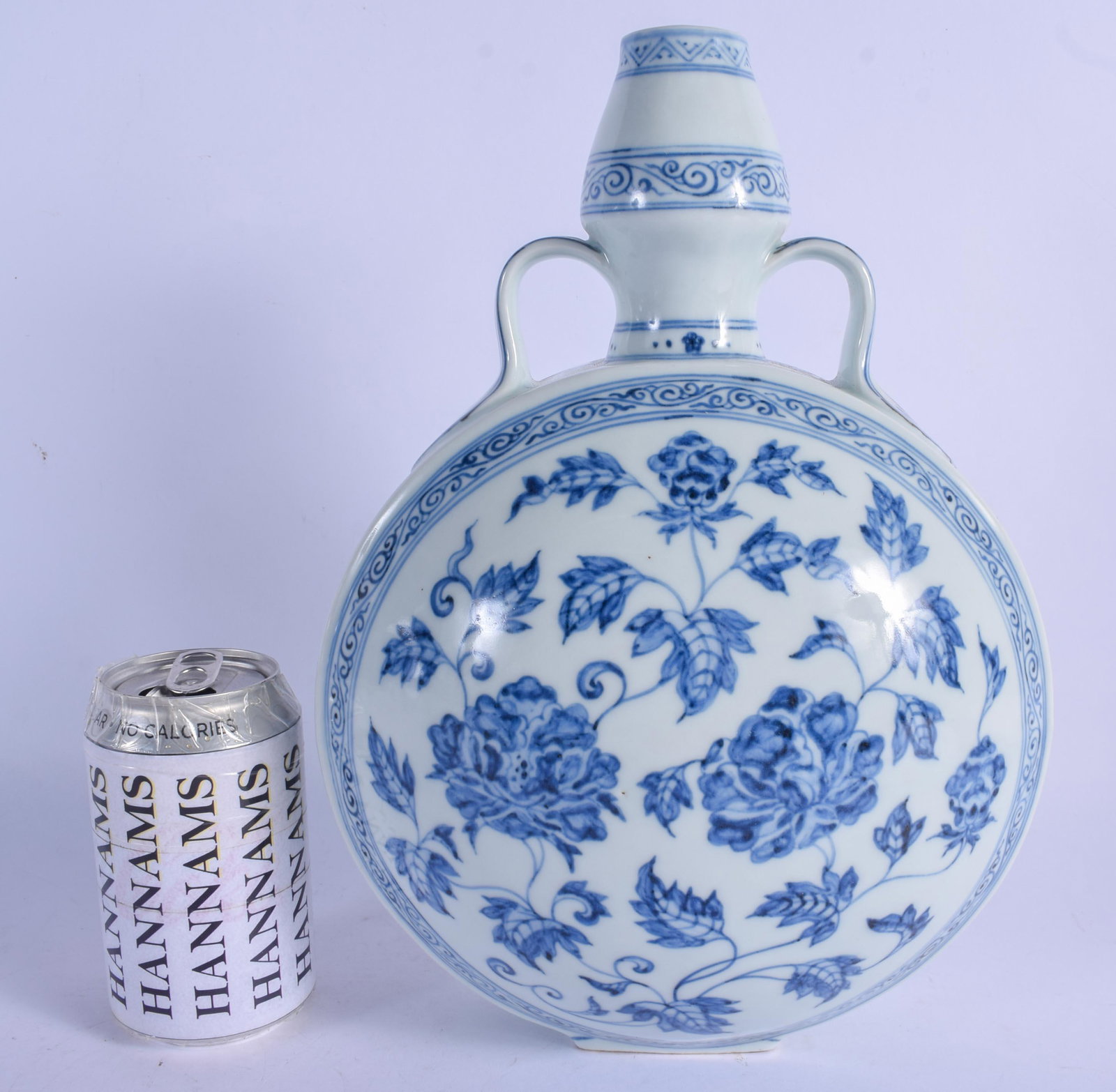 A CHINESE TWIN HANDLED BLUE AND WHITE PORCELAIN FLASK: A CHINESE TWIN HANDLED BLUE AND WHITE PORCELAIN FLASK 20th Century. 32 cm x 19 cm.