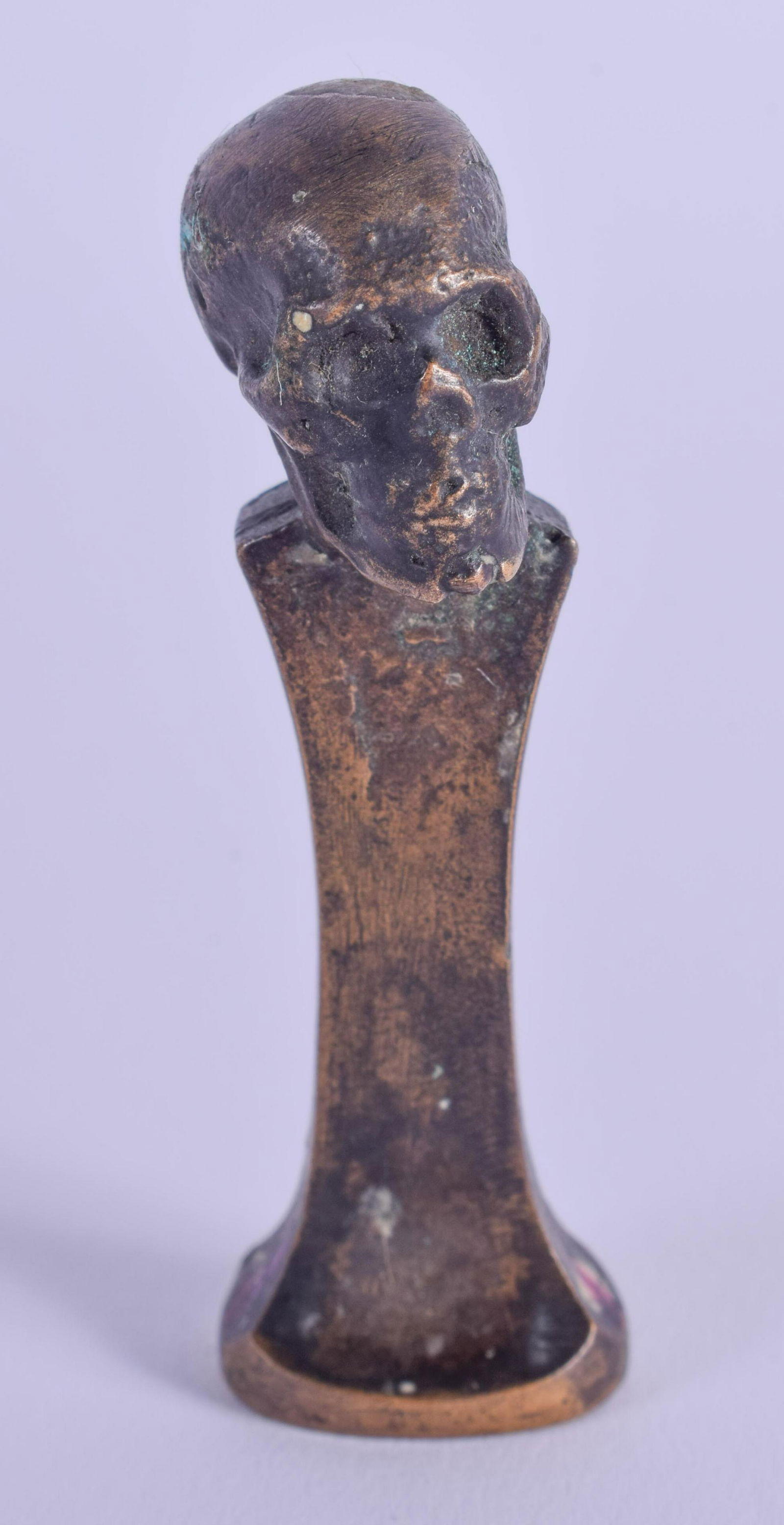 A CONTEMPORARY SS SKULL BRONZE SEAL. 5.5 cm high. (1 of 3)