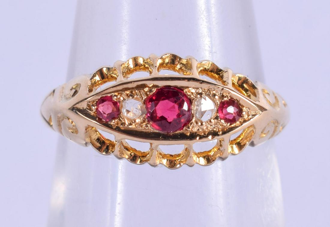 AN 18CT GOLD AND RUBY RING. K. 2.4 grams. (1 of 2)