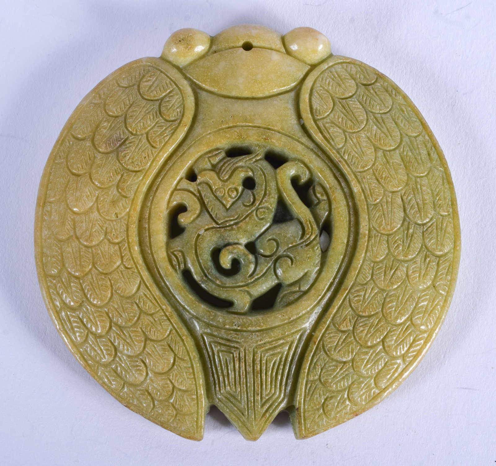 AN EARLY 20TH CENTURY CHINESE CARVED JADEITE FLY: AN EARLY 20TH CENTURY CHINESE CARVED JADEITE FLY AMULET. 7 cm x 7 cm.