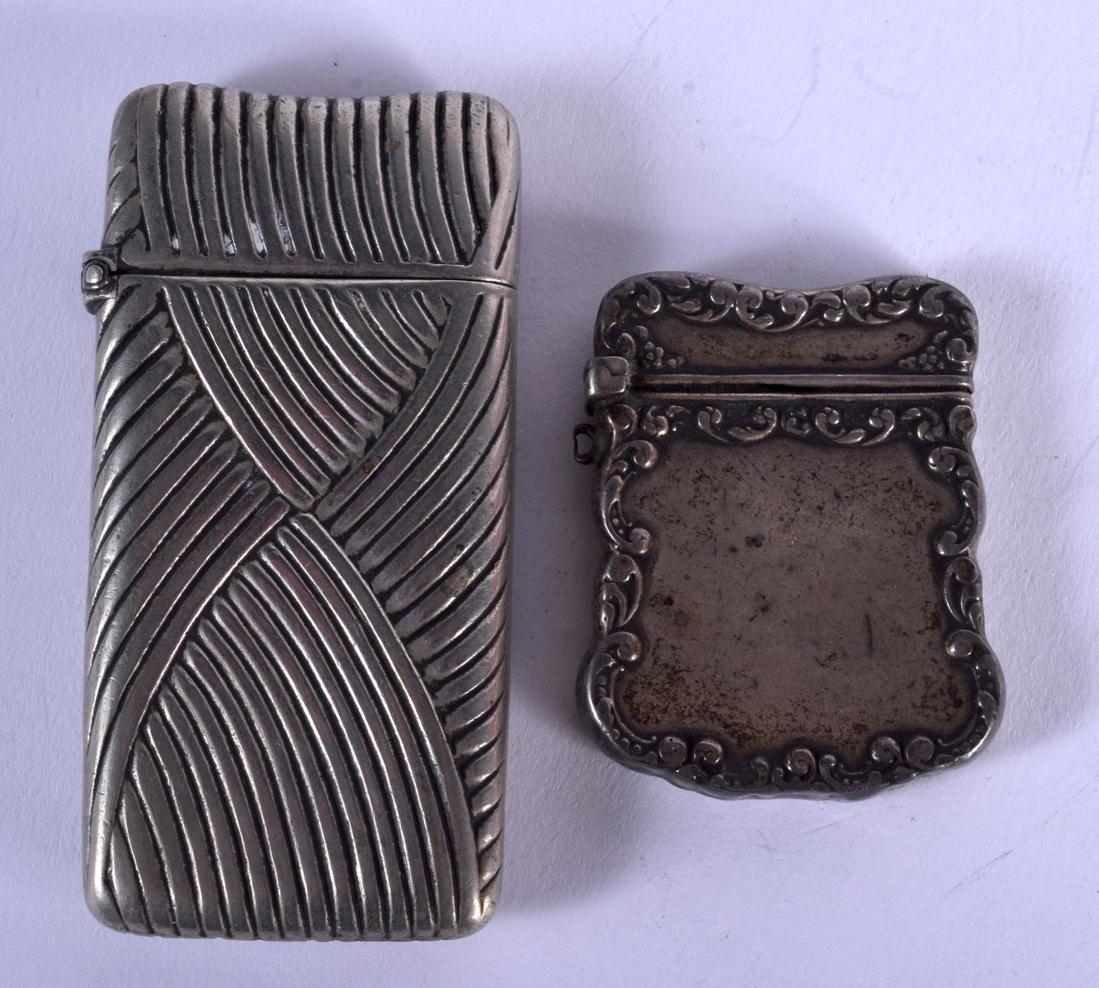 TWO SILVER VESTA CASES. (2) (1 of 5)