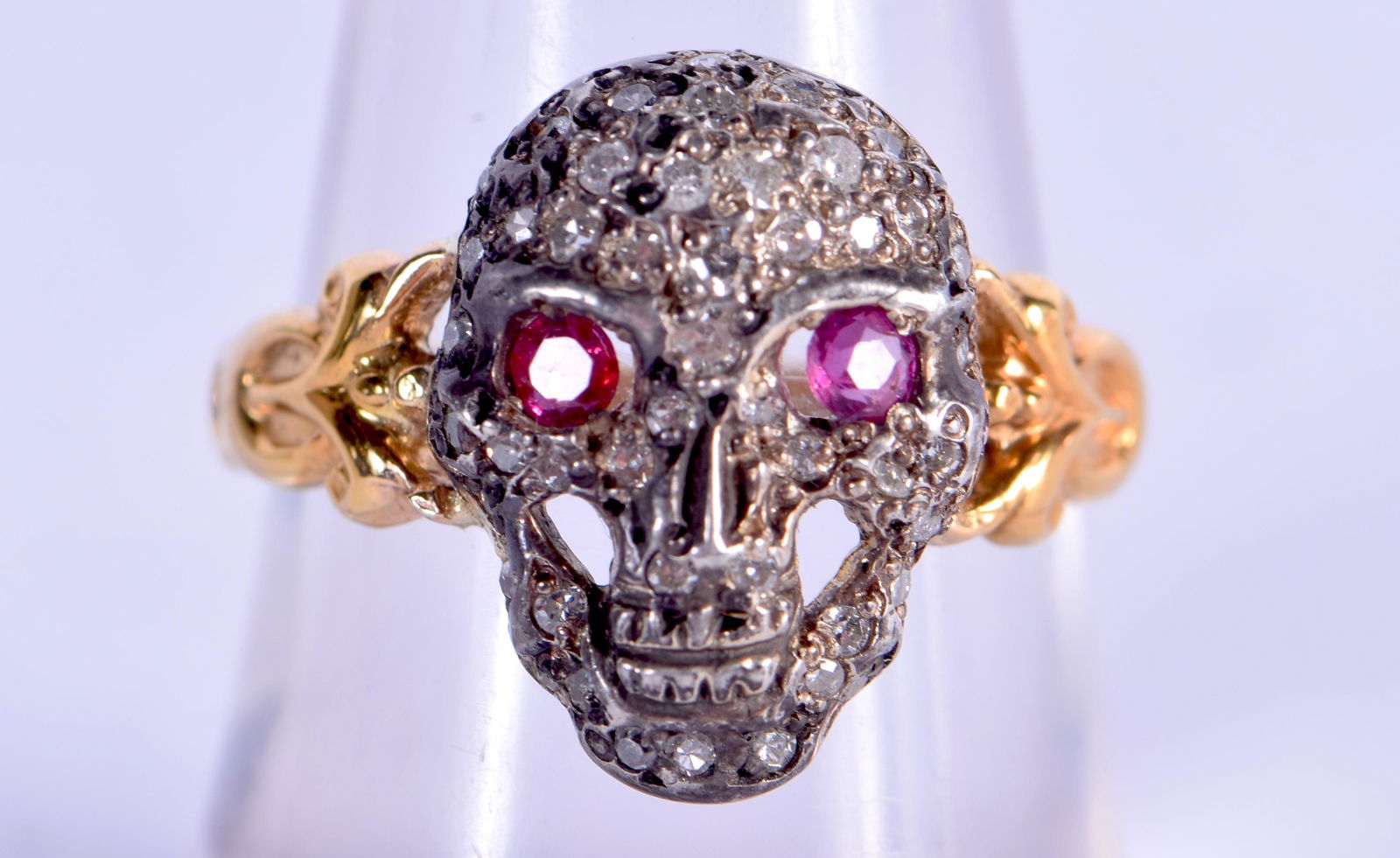 A VINTAGE 18CT GOLD DIAMOND AND RUBY SKULL RING. 4.2 (1 of 3)
