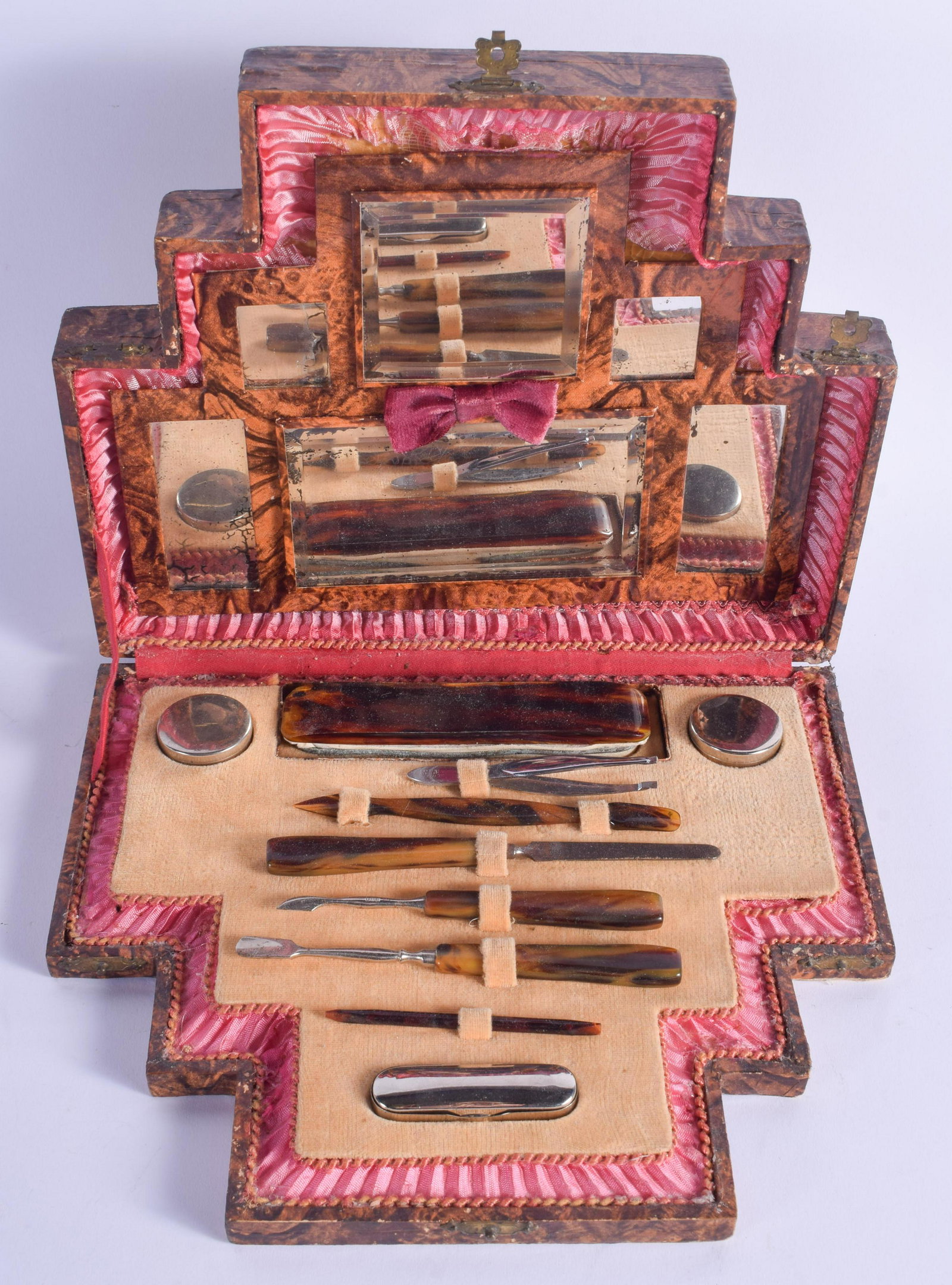 A 1940S CHROME AND BAKELITE DRESSING TABLE SET with: A 1940S CHROME AND BAKELITE DRESSING TABLE SET with fitted mirror. 25 cm x 22 cm.