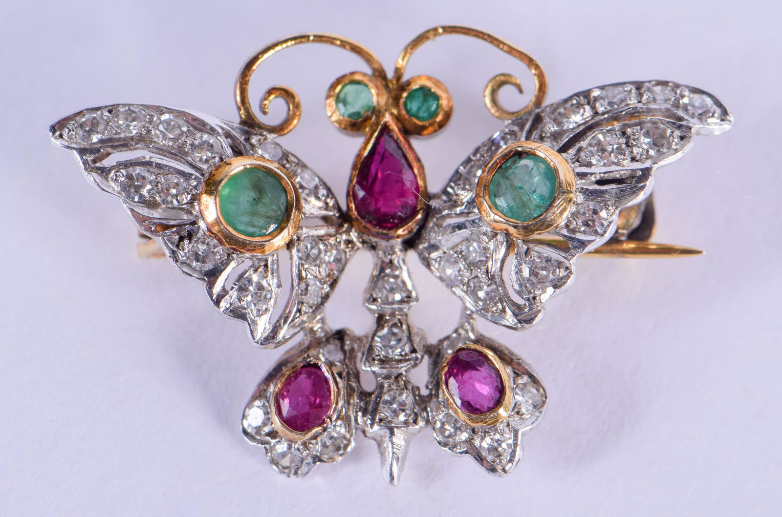 AN ANTIQUE GOLD DIAMOND RUBY AND EMERALD BUTTERFLY (1 of 3)