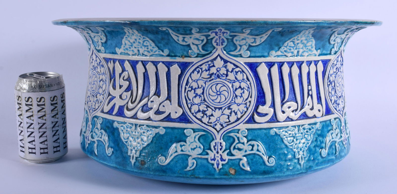 A MAJESTIC 19TH CENTURY FRENCH PARIS MAMLUK STYLE: A MAJESTIC 19TH CENTURY FRENCH PARIS MAMLUK STYLE POTTERY BASIN by Theodore Deck, moulded and decorated in cobalt blue, decorated with a band of kufic script interspersed by pole medallions. 38 cm x 2