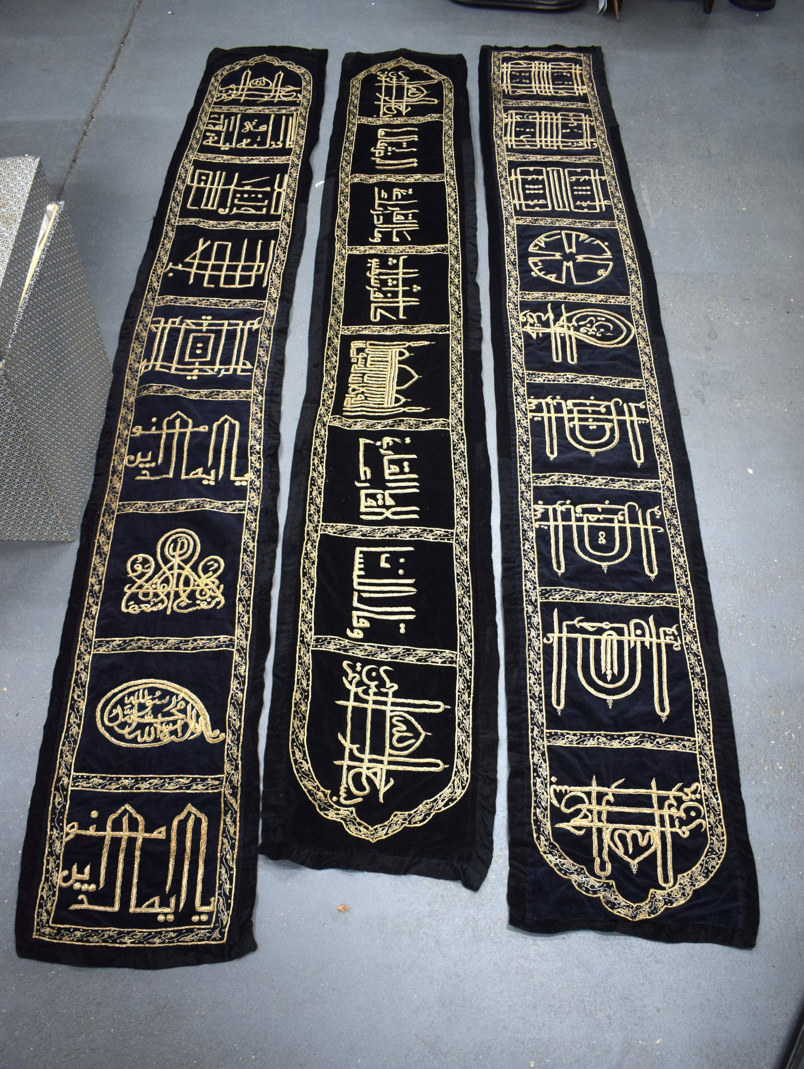 THREE MIDDLE EASTERN OTTOMAN TURKISH INDIAN CALLIGRAPHY: THREE MIDDLE EASTERN OTTOMAN TURKISH INDIAN CALLIGRAPHY HANGING PANELS. 280 cm x 80 cm. (3)