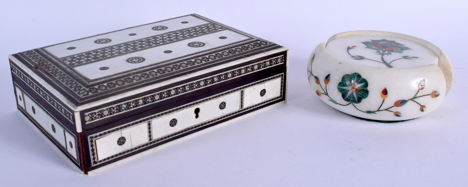 A 19TH CENTURY ANGLO INDIAN CARVED BONE BOX together: A 19TH CENTURY ANGLO INDIAN CARVED BONE BOX together with an Indian marble coaster set. Largest 17 cm wide. (qty)