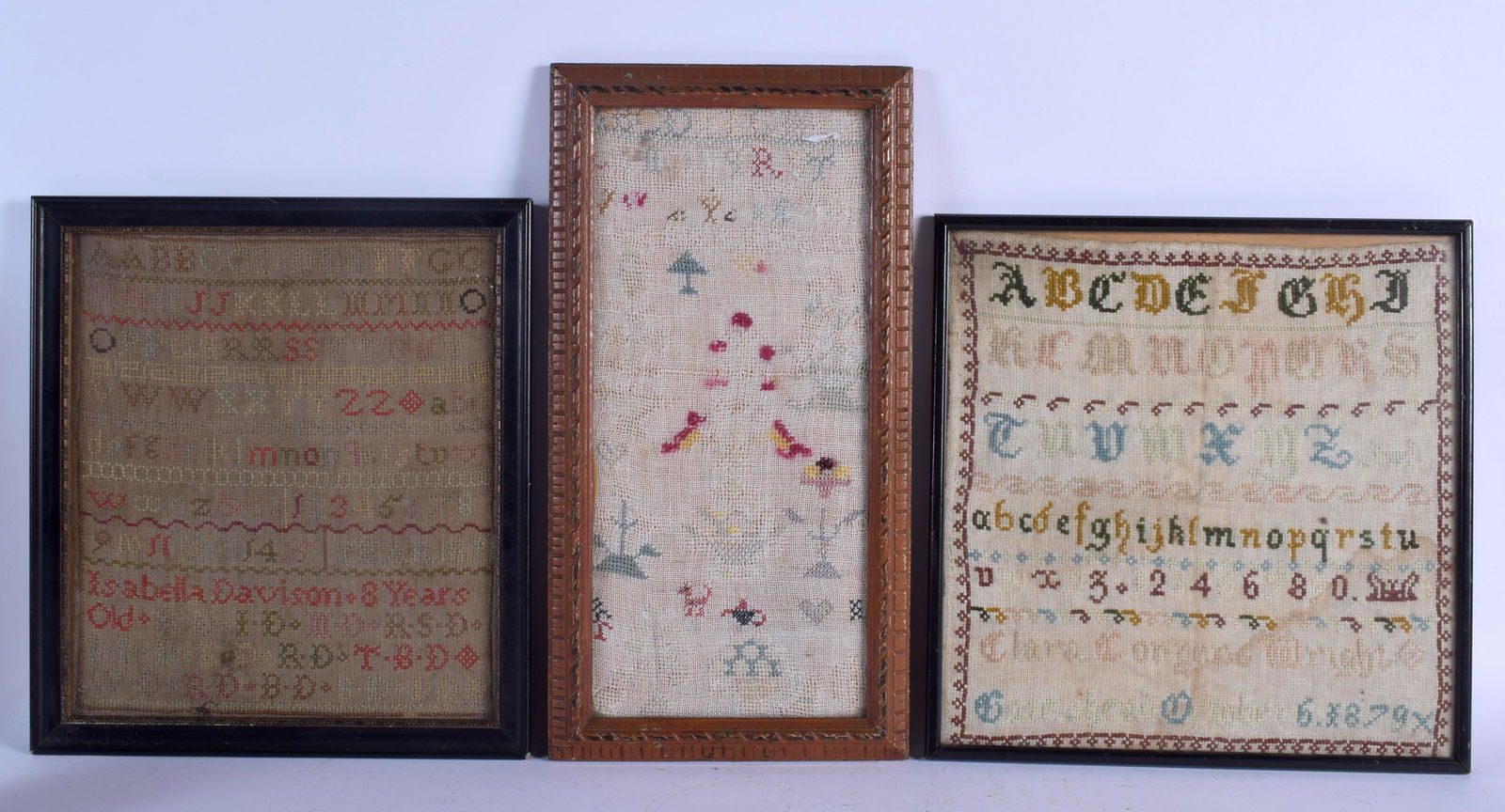 THREE 19TH CENTURY FRAMED EMBROIDERED SAMPLERS. Largest: THREE 19TH CENTURY FRAMED EMBROIDERED SAMPLERS. Largest sampler 30 cm square. (3)