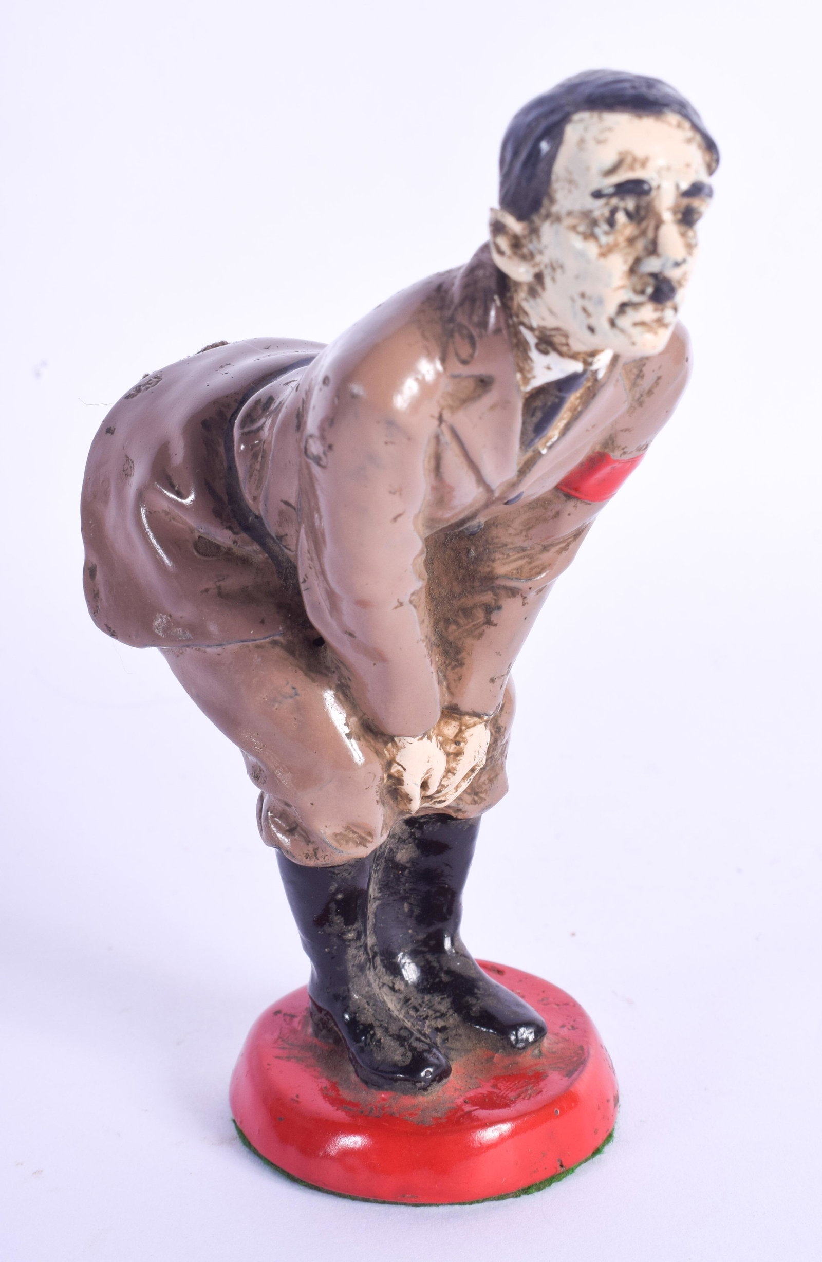 A CONTEMPORARY COLD PAINTED HITLER PIN CUSHION. 13 cm: A CONTEMPORARY COLD PAINTED HITLER PIN CUSHION. 13 cm high.