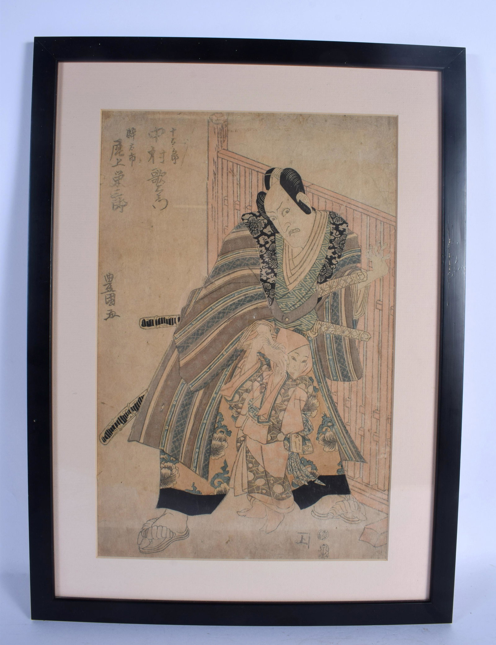 A 19TH CENTURY JAPANESE MEIJI PERIOD WOODBLOCK PRINT: A 19TH CENTURY JAPANESE MEIJI PERIOD WOODBLOCK PRINT depicting a samurai. Image 36 cm x 22 cm.