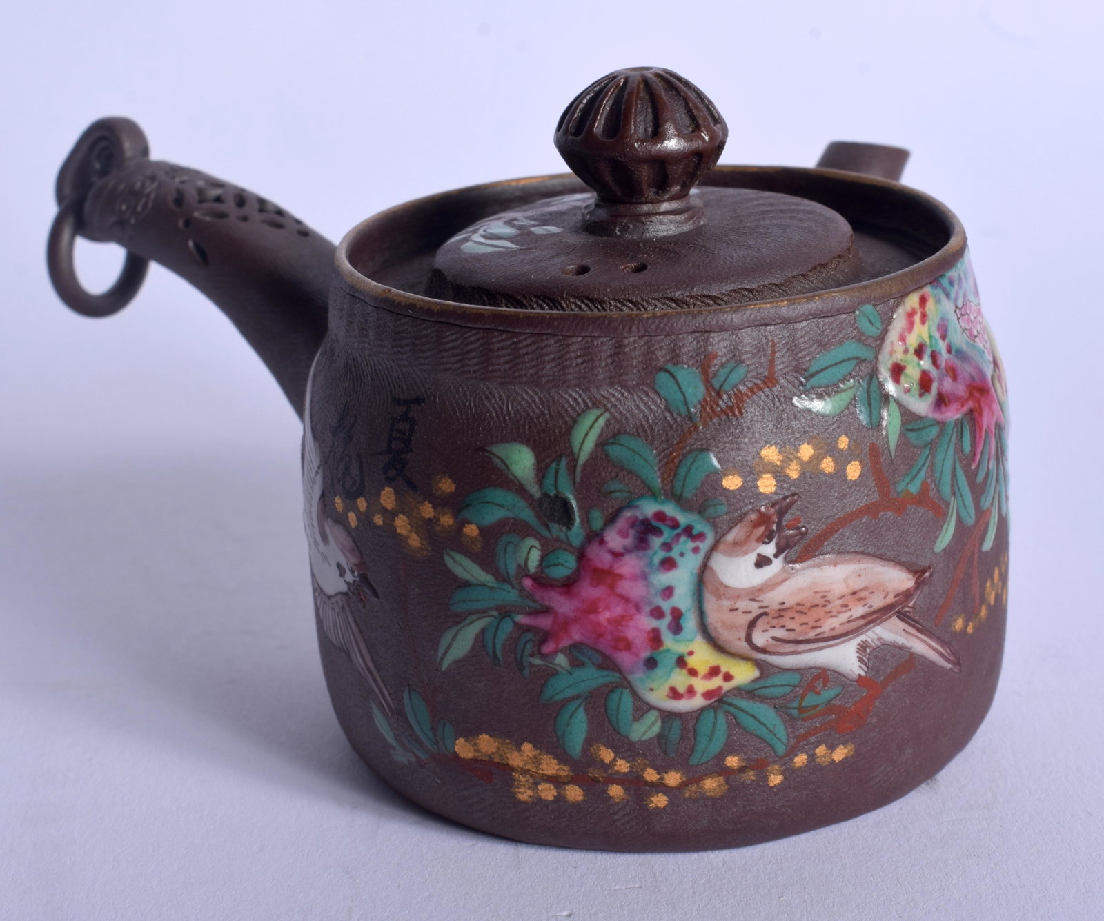 A 19TH CENTURY JAPANESE MEIJI PERIOD ENAMELLED YIXING: A 19TH CENTURY JAPANESE MEIJI PERIOD ENAMELLED YIXING TERRACOTTA TEAPOT painted with birds. 11 cm wide.