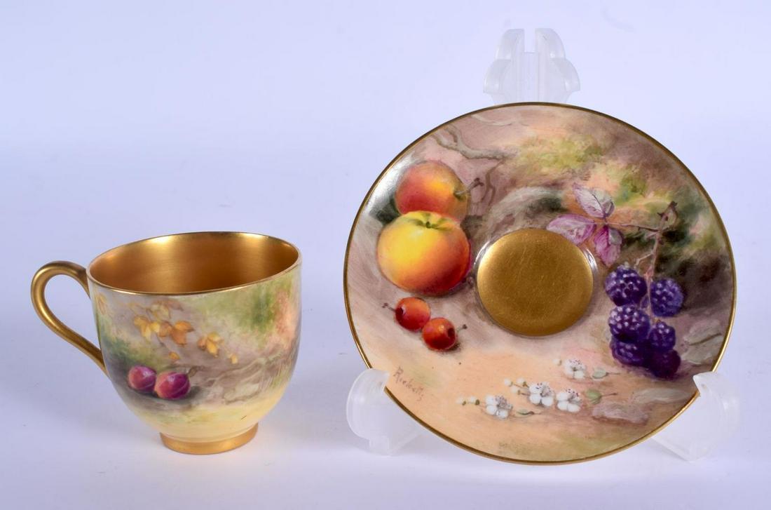 Royal Worcester demi tasse coffee cup and saucer: Royal Worcester demi tasse coffee cup and saucer painted with fruit by Ricketts, signed, date code for 1914. Cup 5cm high, Saucer 9.5cm wide
