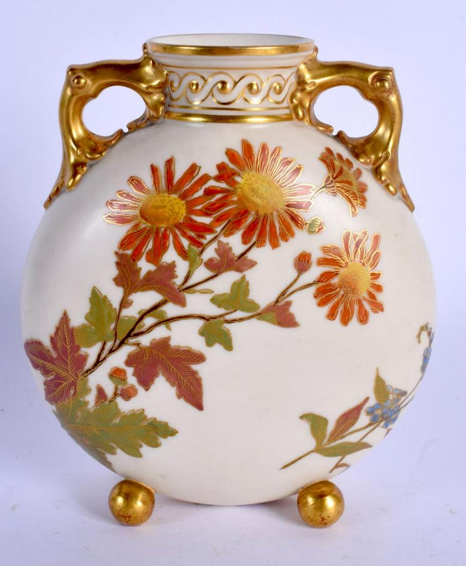 Royal Worcester two handled moonflask painted with: Royal Worcester two handled moonflask painted with flowers on an bone ground date code 1890. 13cm high