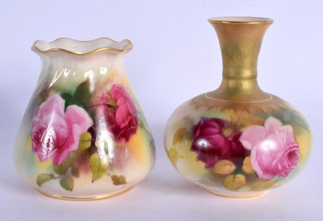 Royal Worcester vase of ovoid shape with short neck: Royal Worcester vase of ovoid shape with short neck painted with pink and red roses date code 1919 shape F110 H, and a sack shaped vase date code 1912, shape G257. Short Vase 10cm high, Sack Vase 8.5c