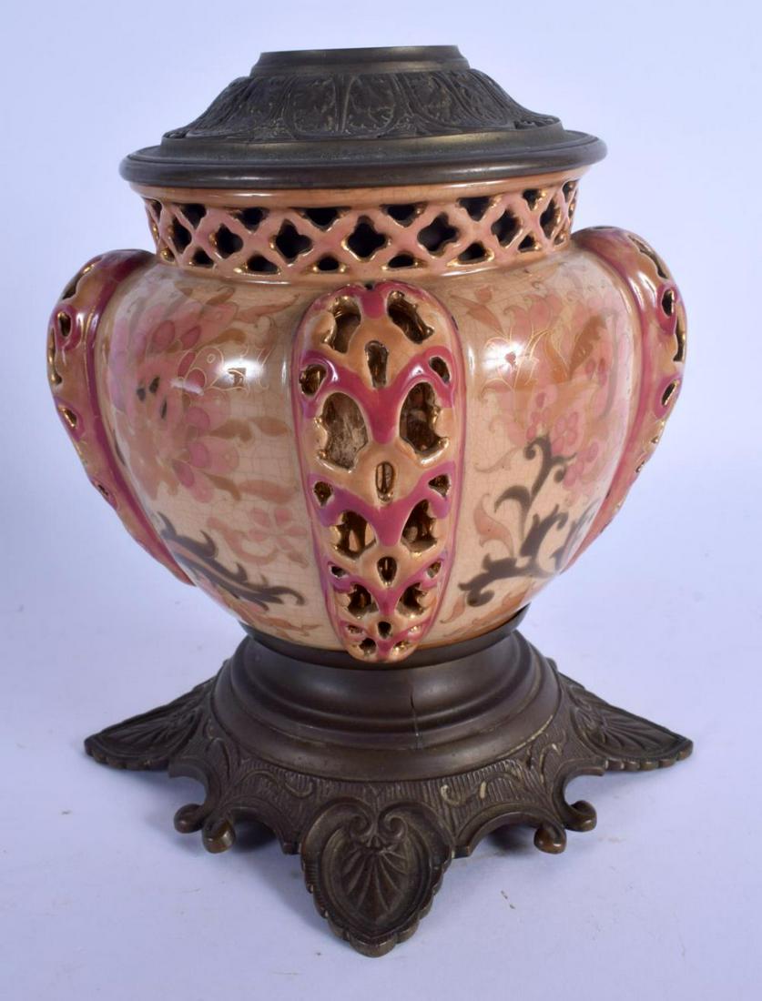 A 19TH CENTURY HUNGARIAN PORCELAIN VASE Fischer or: A 19TH CENTURY HUNGARIAN PORCELAIN VASE Fischer or Zsolnay, painted with flowers. 21 cm x 12 cm.