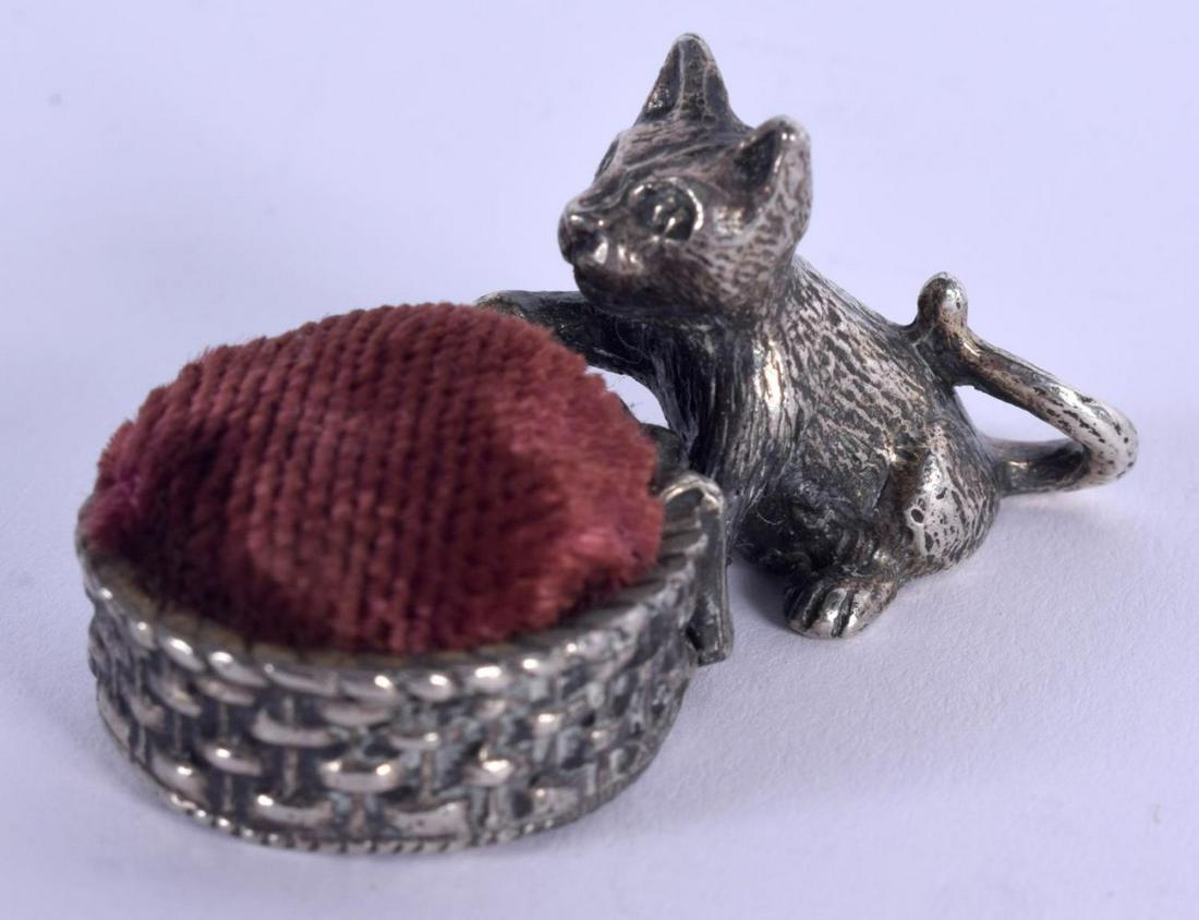 A 1940S SILVER PLATED CAT PIN CUSHION. 4 cm x 2 cm. (1 of 3)