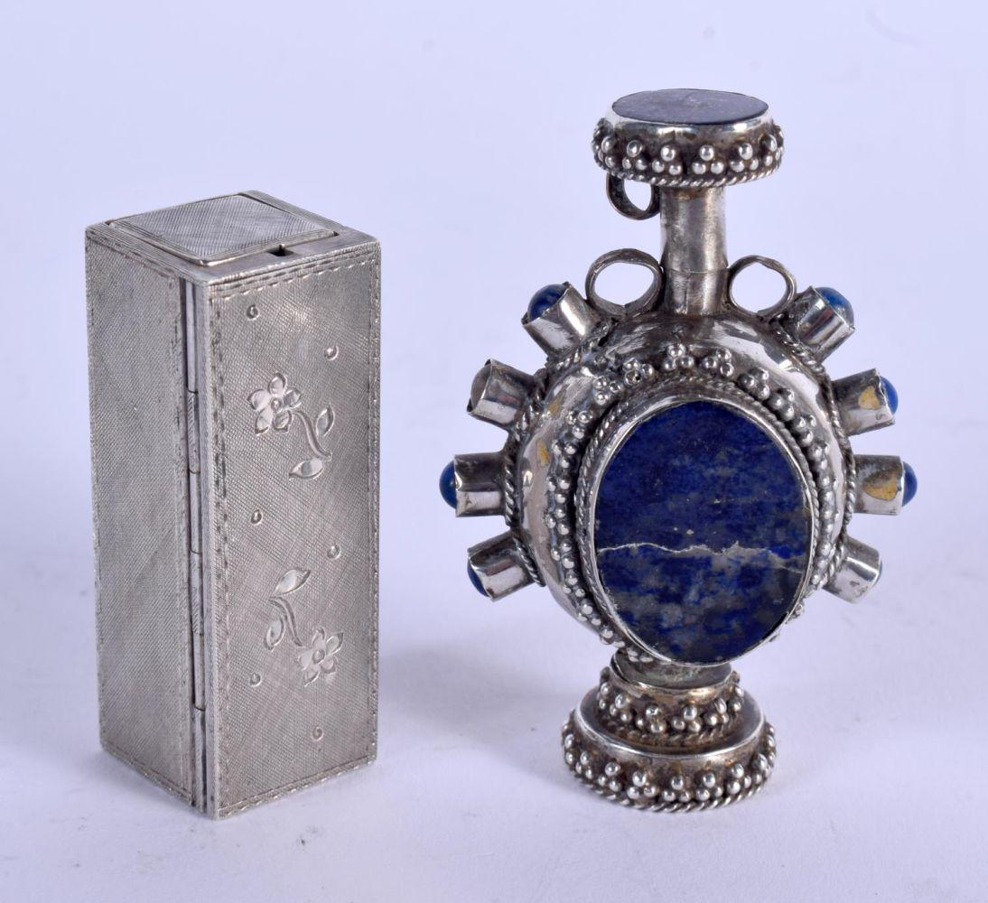 AN ITALIAN SILVER LIPSTICK HOLDER and a silver bottle. (1 of 3)