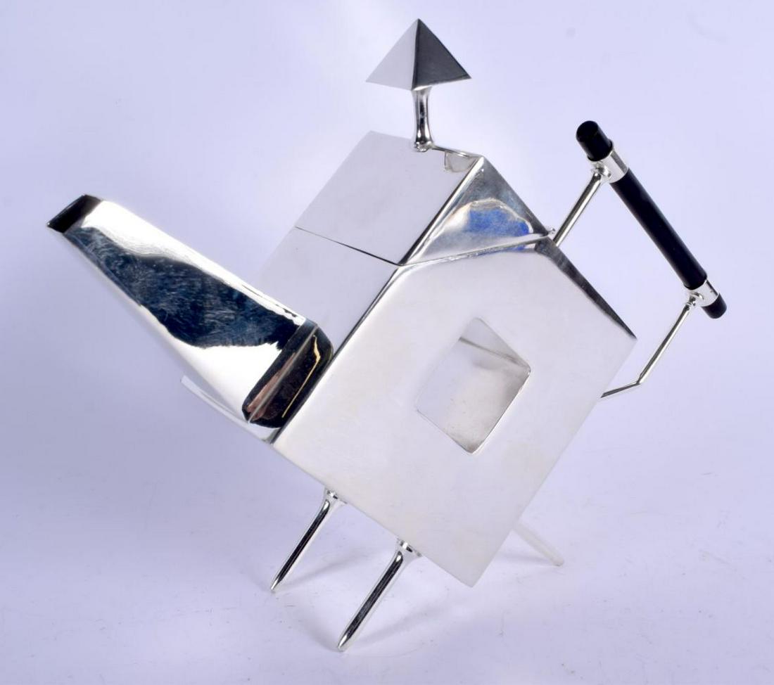 A CHRISTOPHER DRESSER STYLE SILVER PLATED TEAPOT. 25 cm (1 of 3)