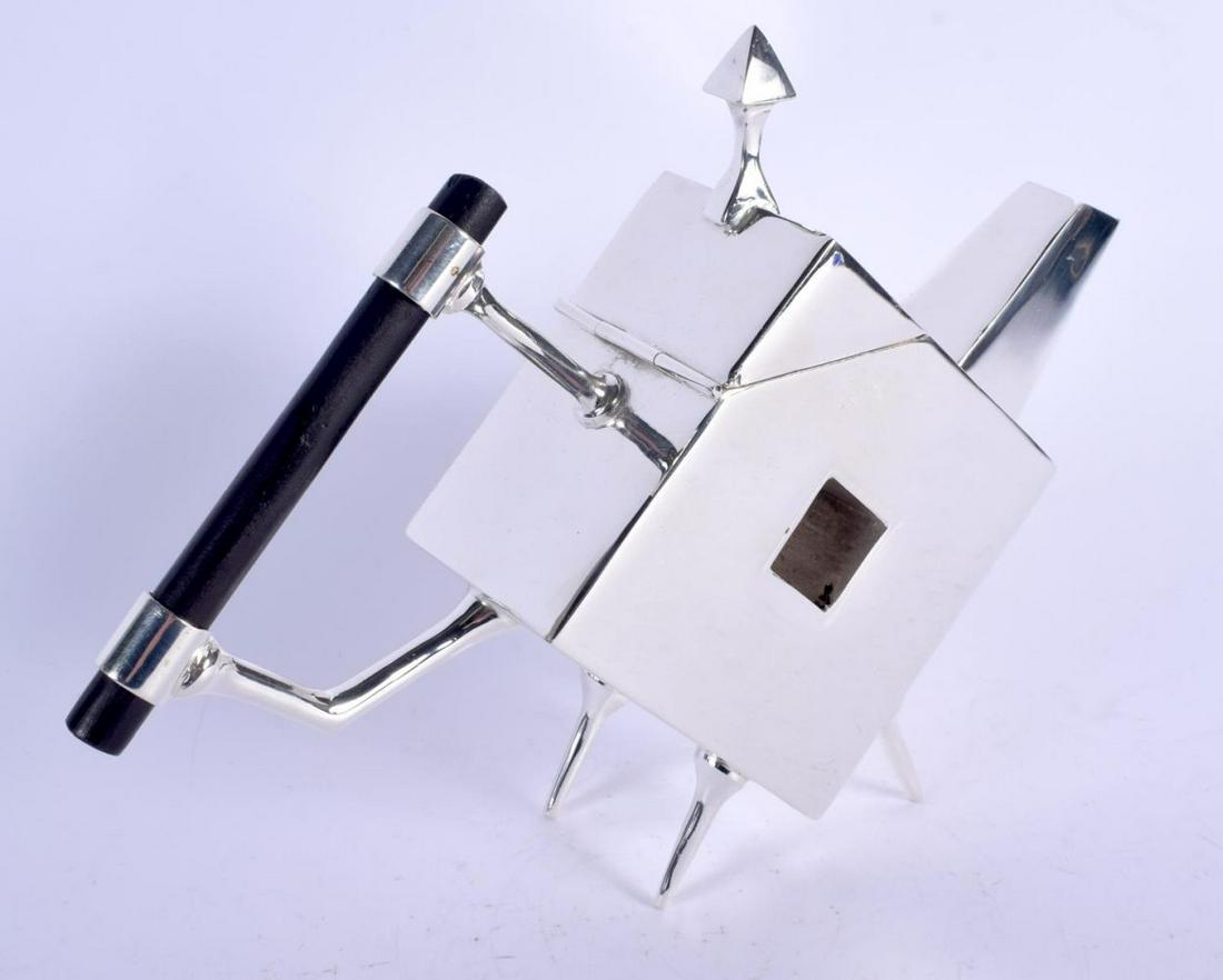 A CHRISTOPHER DRESSER STYLE SILVER PLATED TEAPOT. 22 cm (1 of 3)