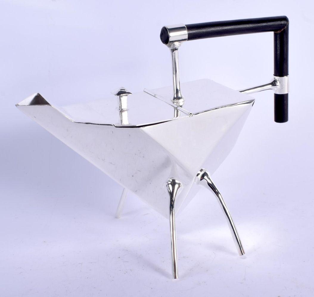 A CHRISTOPHER DRESSER STYLE SILVER PLATED TEAPOT. 22 cm (1 of 3)