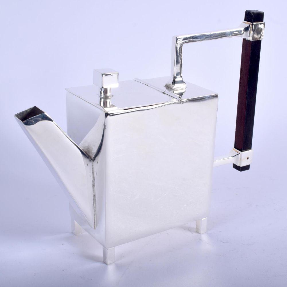 A CHRISTOPHER DRESSER STYLE SILVER PLATED TEAPOT. 22 cm (1 of 3)