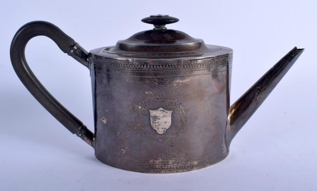 A GEORGE III SILVER TEAPOT AND COVER. London 1796. 436 (1 of 4)
