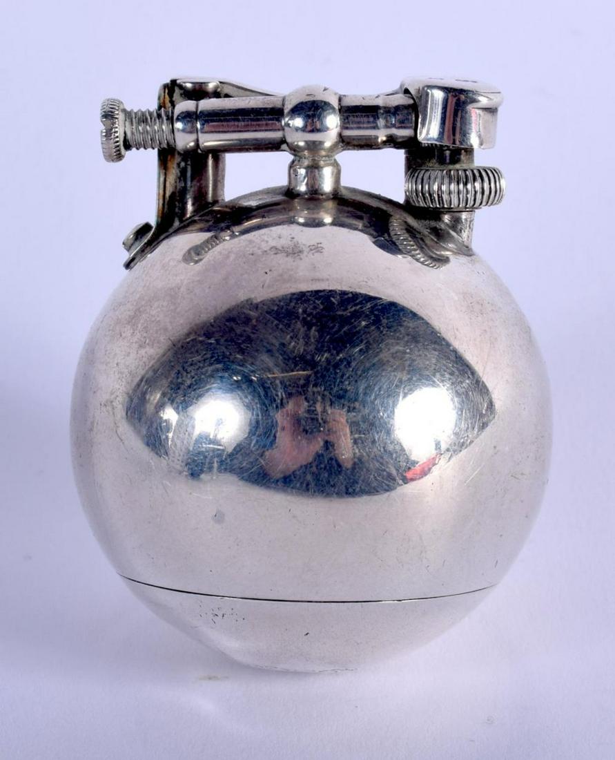 A RARE ART DECO SILVER BALL UNIQUE DUNHILL LIGHTER.