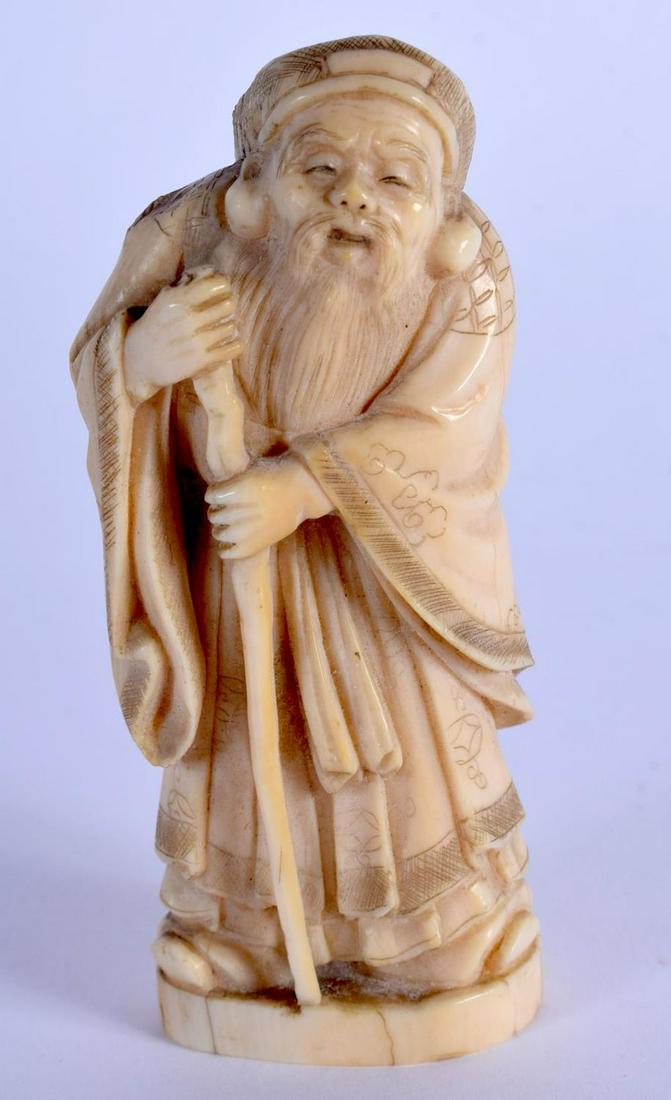 A 19TH CENTURY JAPANESE MEIJI PERIOD CARVED BONE: A 19TH CENTURY JAPANESE MEIJI PERIOD CARVED BONE OKIMONO. 7 cm high.