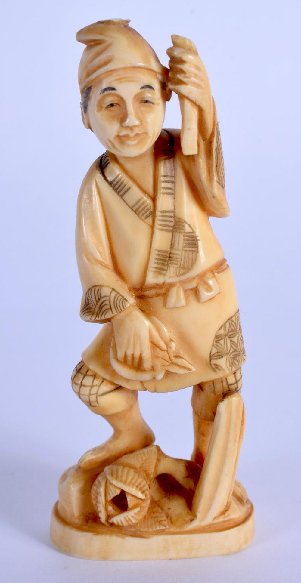 A 19TH CENTURY JAPANESE MEIJI PERIOD CARVED BONE: A 19TH CENTURY JAPANESE MEIJI PERIOD CARVED BONE OKIMONO. 8.5 cm high.