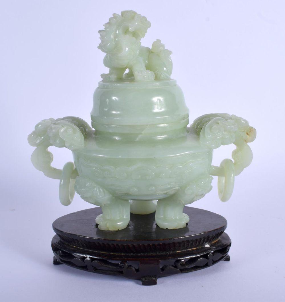 AN EARLY 20TH CENTURY CHINESE TWIN HANDLED JADE CENSER: AN EARLY 20TH CENTURY CHINESE TWIN HANDLED JADE CENSER AND COVER Late Qing/Republic. Jade 19 cm x 17 cm.