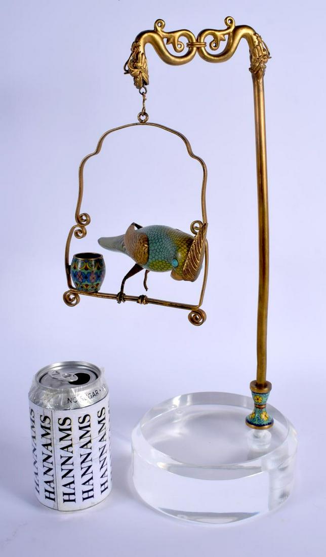 A RARE EARLY 20TH CENTURY CHINESE CLOISONNE ENAMEL: A RARE EARLY 20TH CENTURY CHINESE CLOISONNE ENAMEL PARROT Late Qing/Republic, upon a later base. 40 cm high.