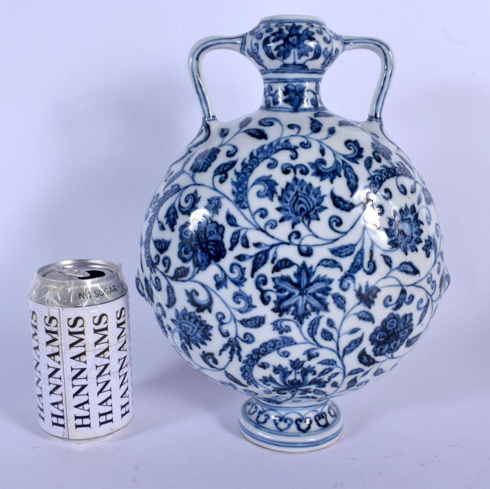 A CHINESE TWIN HANDLED PORCELAIN VASE 20th Century,: A CHINESE TWIN HANDLED PORCELAIN VASE 20th Century, painted with foliage. 35 cm high.
