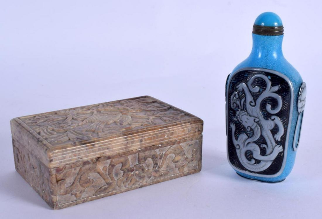 AN EARLY 20TH CENTURY CHINESE PEKING SNUFF BOTTLE AND: AN EARLY 20TH CENTURY CHINESE PEKING SNUFF BOTTLE AND STOPPER together with a Qing soapstone box and cover. Largest 10 cm x 7 cm. (2)