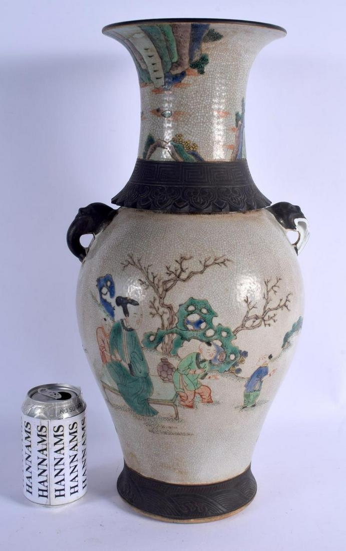 A LARGE CHINESE TWIN HANDLED CRACKLE GLAZED VASE 20th: A LARGE CHINESE TWIN HANDLED CRACKLE GLAZED VASE 20th Century, bearing Kangxi marks to base. 46 cm x 18 cm.