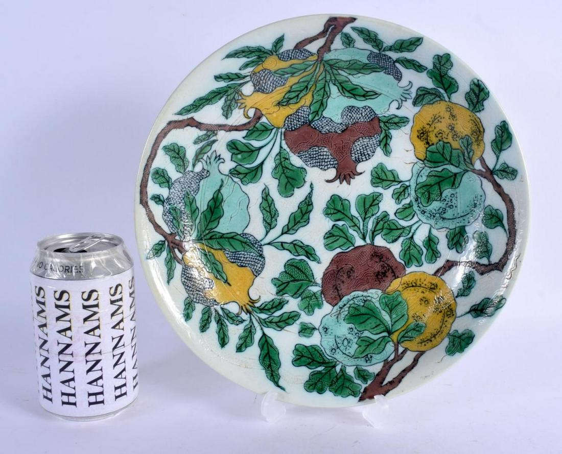 A LARGE 19TH CENTURY CHINESE EGG AND SPINACH SAUCERDISH: A LARGE 19TH CENTURY CHINESE EGG AND SPINACH SAUCERDISH bearing Kangxi marks to base, painted with fruiting pod. 25 cm diameter.
