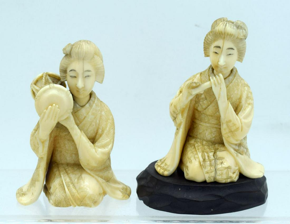 A PAIR OF 19TH CENTURY JAPANESE MEIJI PERIOD CARVED: A PAIR OF 19TH CENTURY JAPANESE MEIJI PERIOD CARVED BONE OKIMONO modelled as musicians. Largest 10 cm x 6 cm. (3)