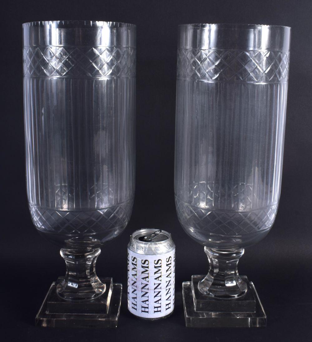 A LARGE PAIR OF CUT GLASS STORM CELERY VASES. 40 cm (1 of 2)