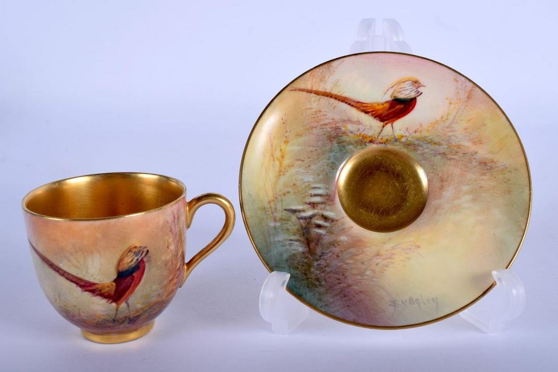 Royal Worcester coffee cup and saucer painted with: Royal Worcester coffee cup and saucer painted with golden pheasants by Sedgley, signed, date mark 1926. Cup 5cm high and Saucer 10cm diameter