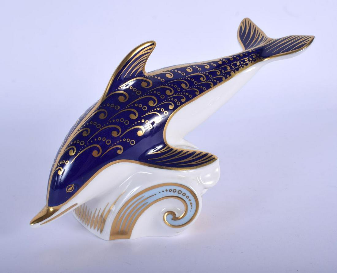 Royal Crown Derby paperweight of a dolphin. 17.5cm: Royal Crown Derby paperweight of a dolphin. 17.5cm long