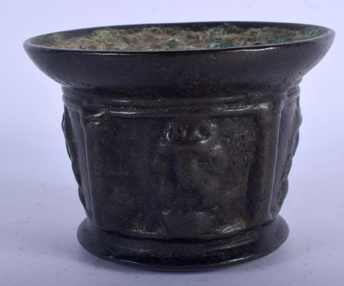 AN EARLY CONTINENTAL BRONZE MORTAR decorated with (1 of 4)