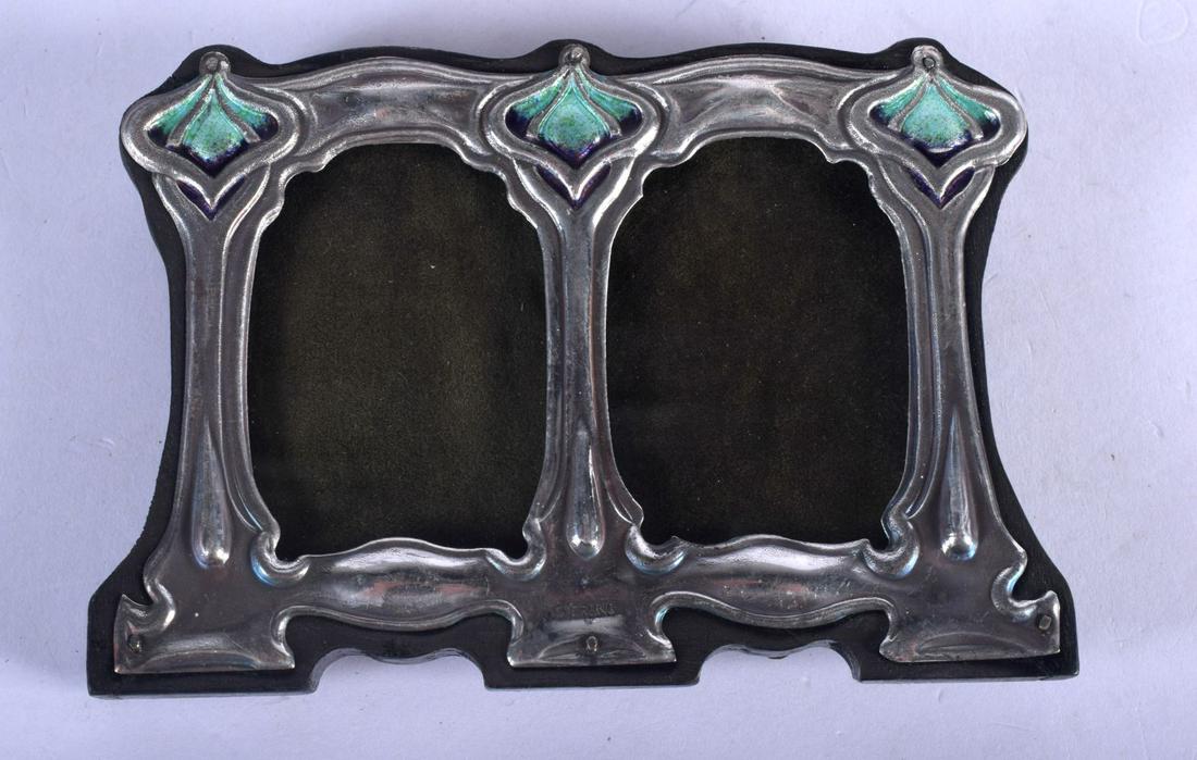 A SILVER AND ENAMEL FRAME. 11.5 cm x 8 cm. (1 of 2)