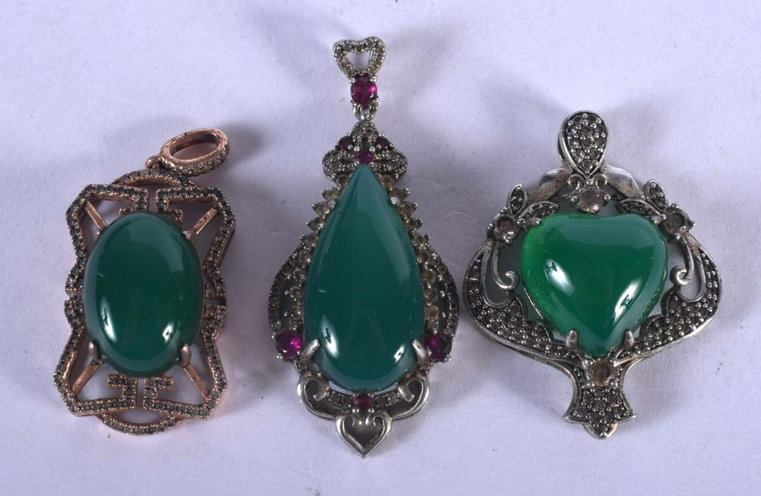 THREE CHINESE JADE PENDANTS. 21 grams. Largest 3.5 cm x (1 of 2)
