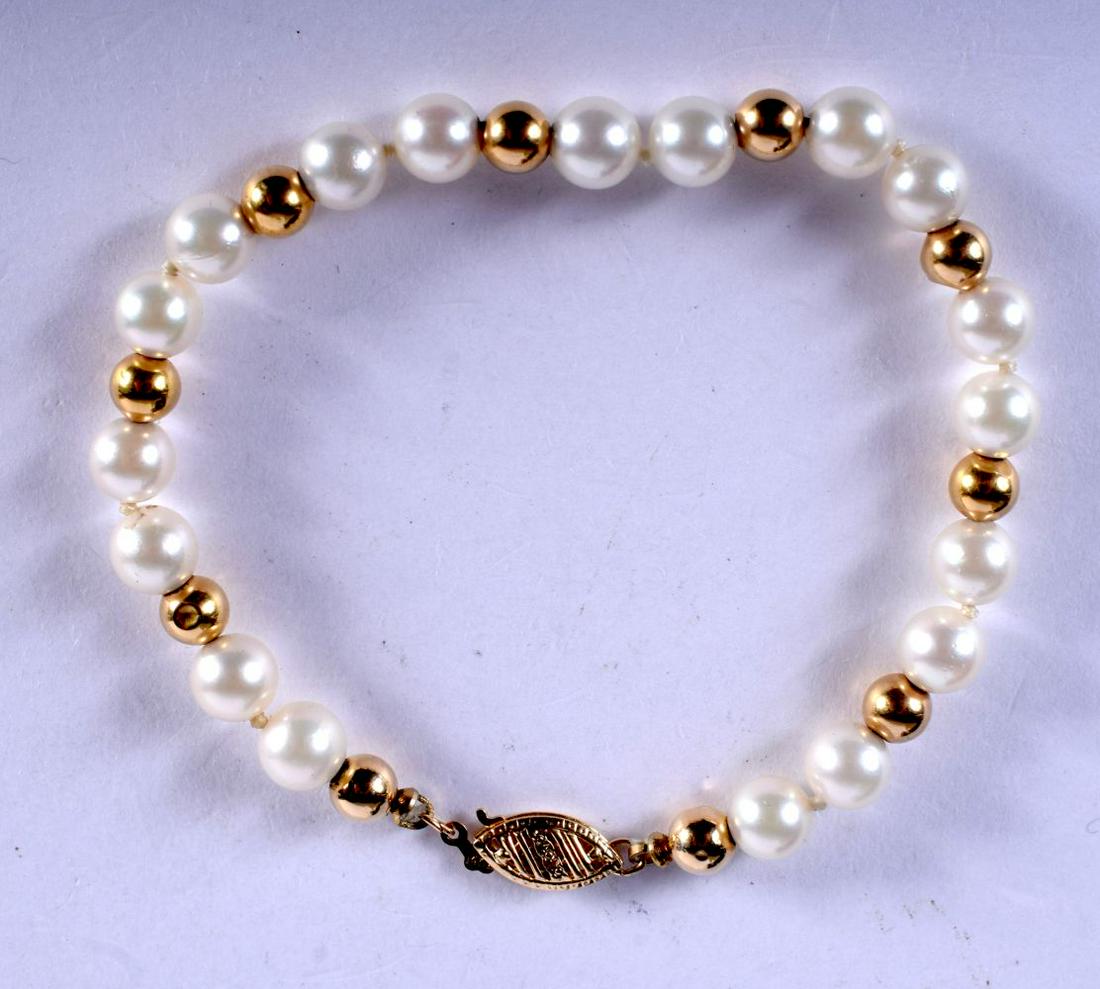 A 14CT GOLD AND PEARL BRACELET. 13 cm long. (1 of 1)