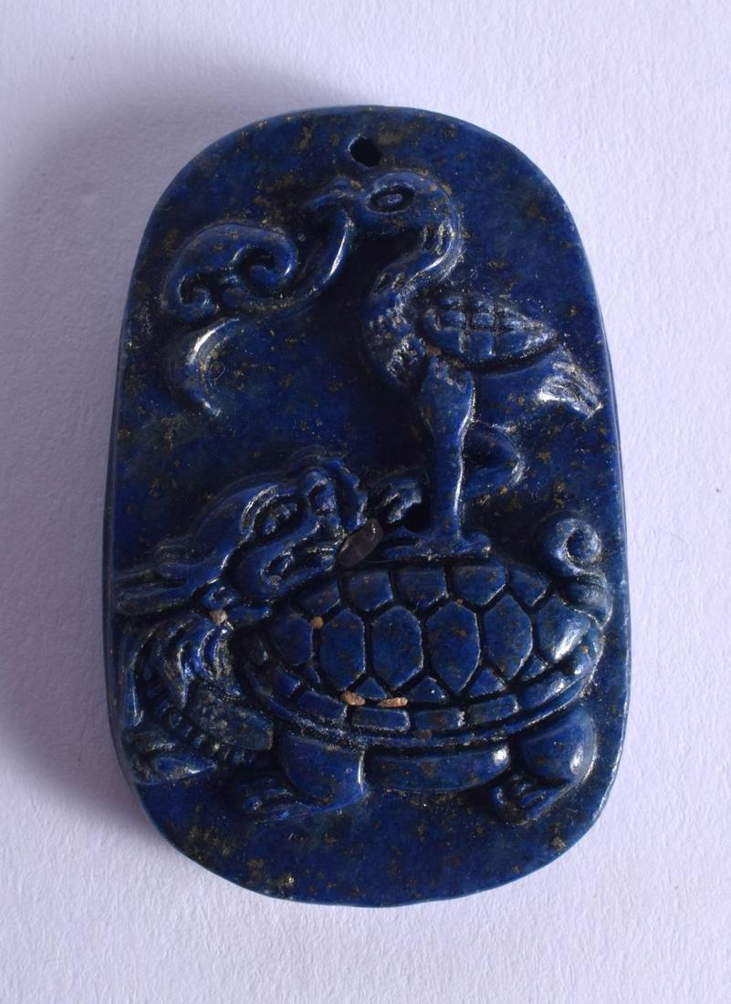 A CHINESE CARVED LAPIS LAZULI PENDANT 20th Century. 5 (1 of 2)