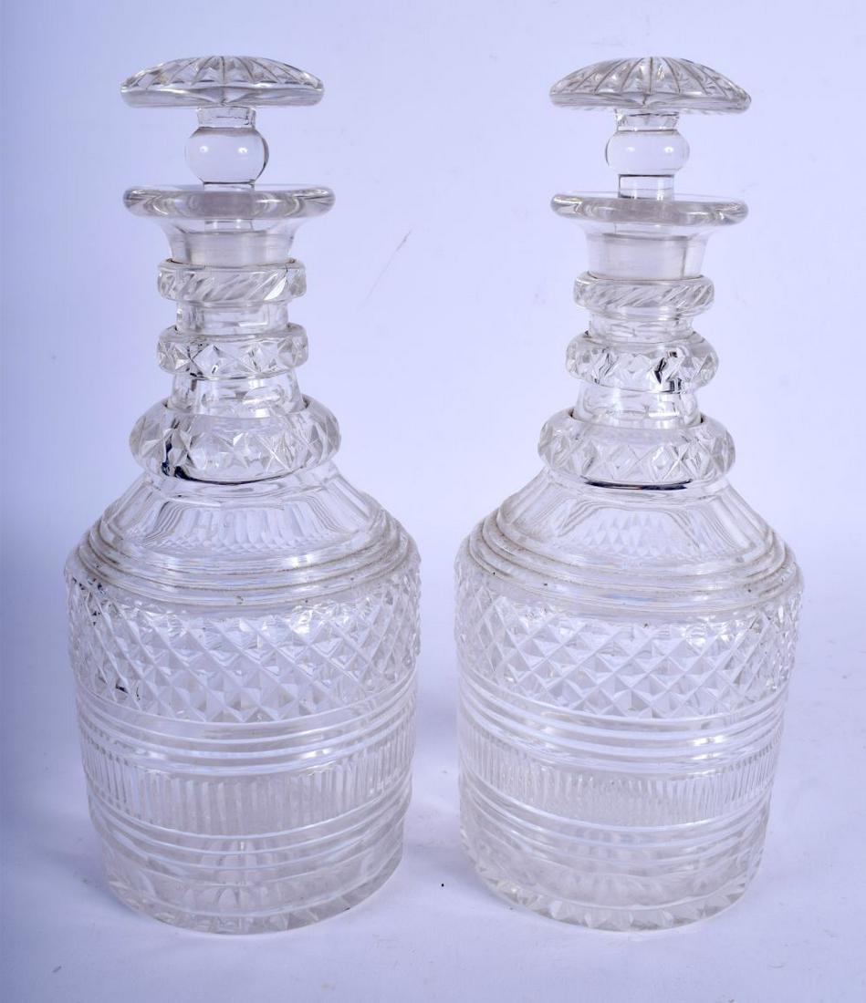 A NEAR PAIR OF GEORGE III CUT GLASS DECANTERS AND (1 of 4)