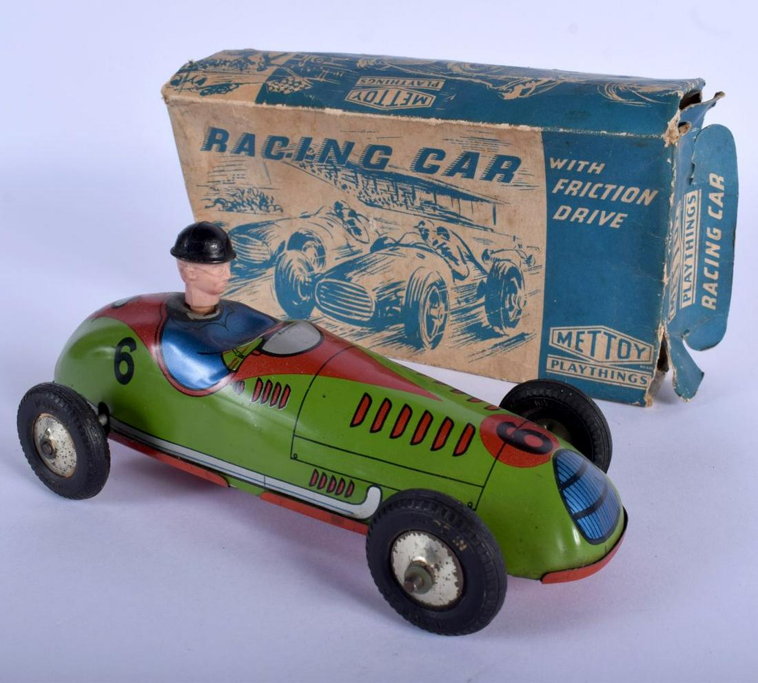 A VINTAGE METTOY BOXED FRICTION DRIVE RACING CAR. 13 cm: A VINTAGE METTOY BOXED FRICTION DRIVE RACING CAR. 13 cm wide.
