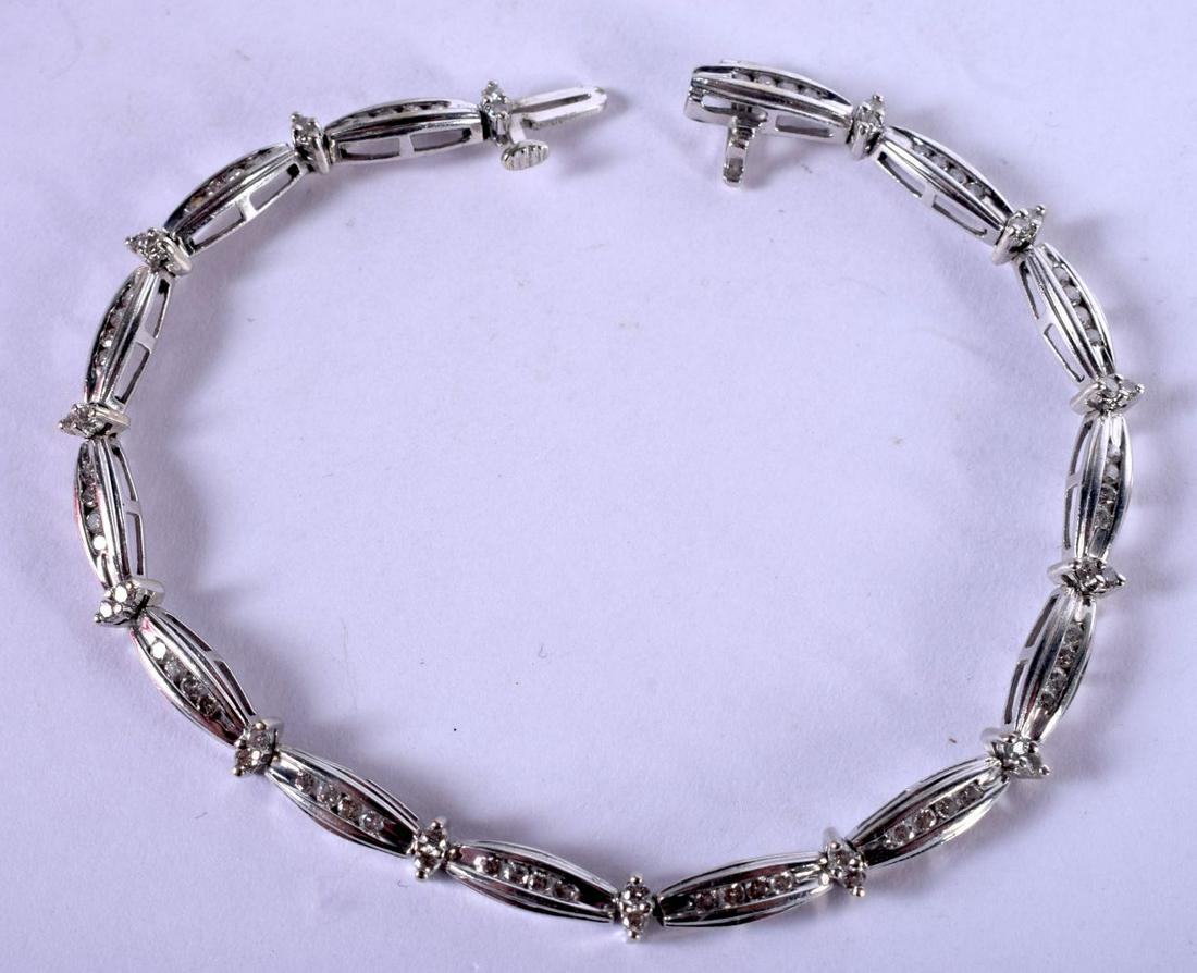 A WHITE METAL GEM SET BRACELET. 9 grams. 18 cm long. (1 of 2)