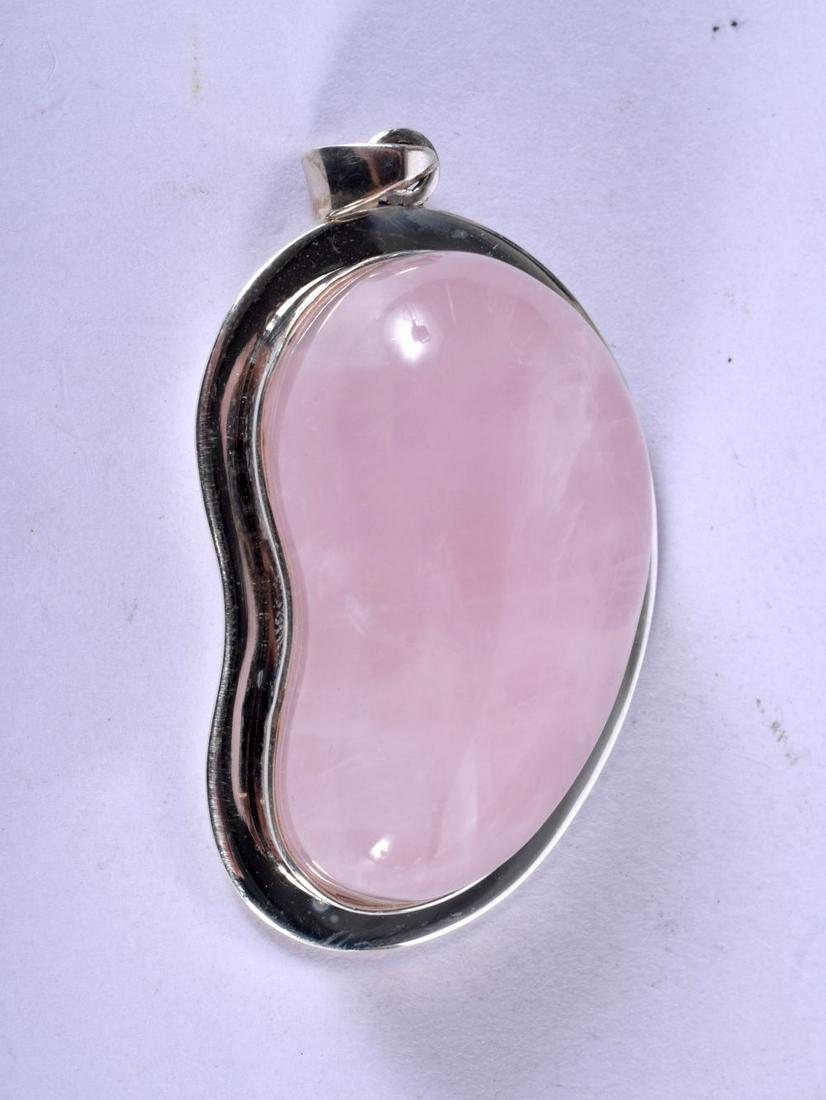 A SILVER AND ROSE QUARTZ PENDANT. 37 grams. 5.5 cm x 3 (1 of 2)